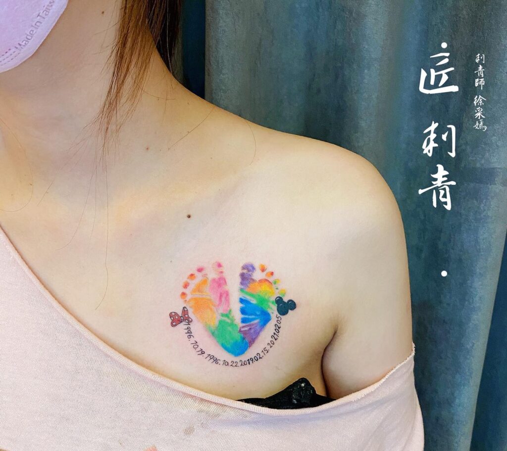 Vibrant Rainbow Footprint Tattoo baby feet tattoos tattoo