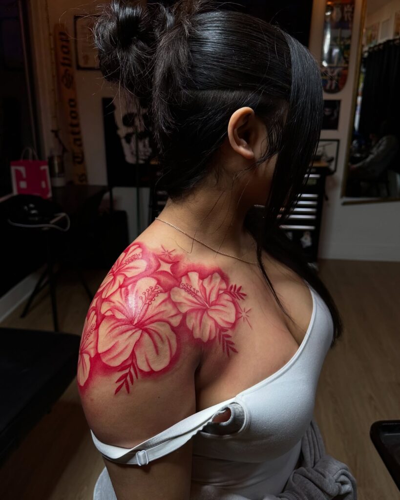 Vibrant Red Hibiscus Shoulder Tattoo women shoulder flower tattoo ideas tattoo