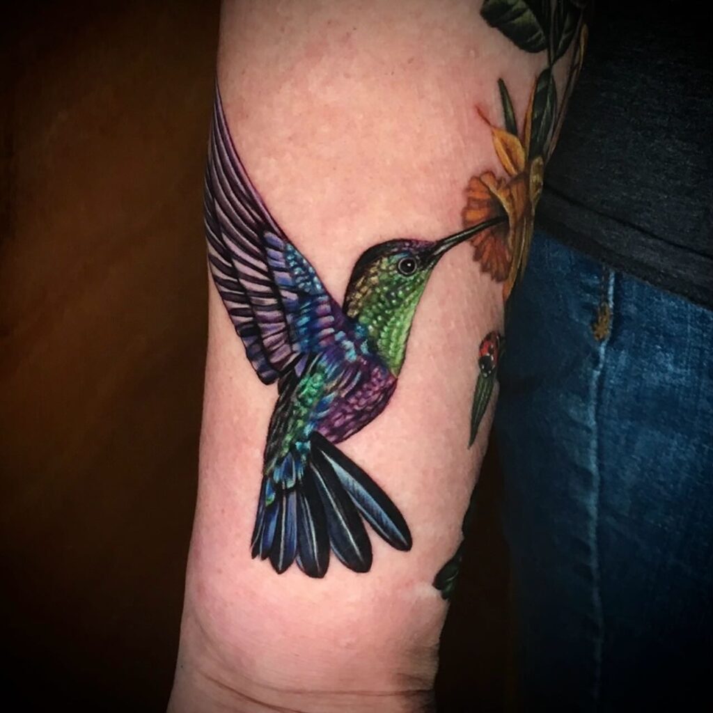 Vivid Hummingbird and Daffodil Tattoo hummingbird tattoos tattoo