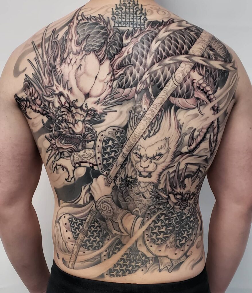 Warrior and Dragon Back Tattoo in Asian Mythological Style back tattoos for guys tattoo