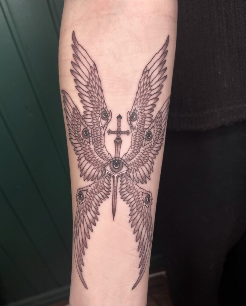 Watchful Seraphim with Sword Tattoo seraphim angel tattoo ideas tattoo