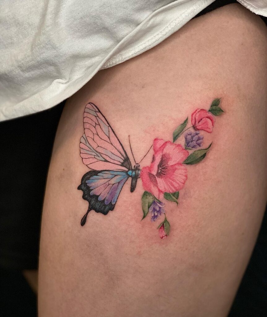 Watercolor Butterfly and Flower Thigh Tattoo half butterfly half flower tattoos tattoo