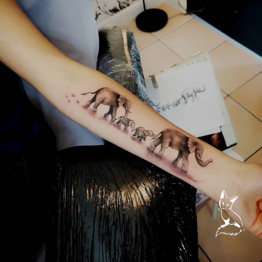 Watercolor Elephant Family Walk Tattoo elephant family tattoo ideas tattoo