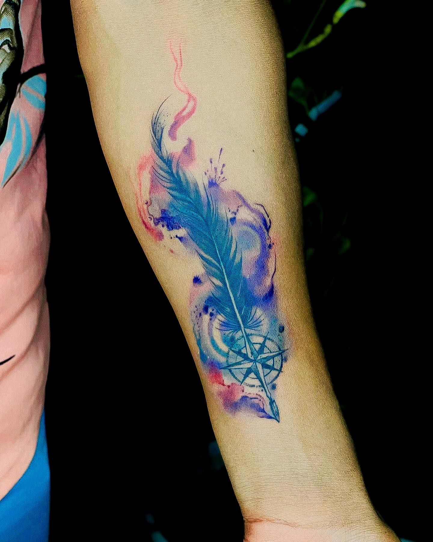 Fine Line Falling Feather Tattoo