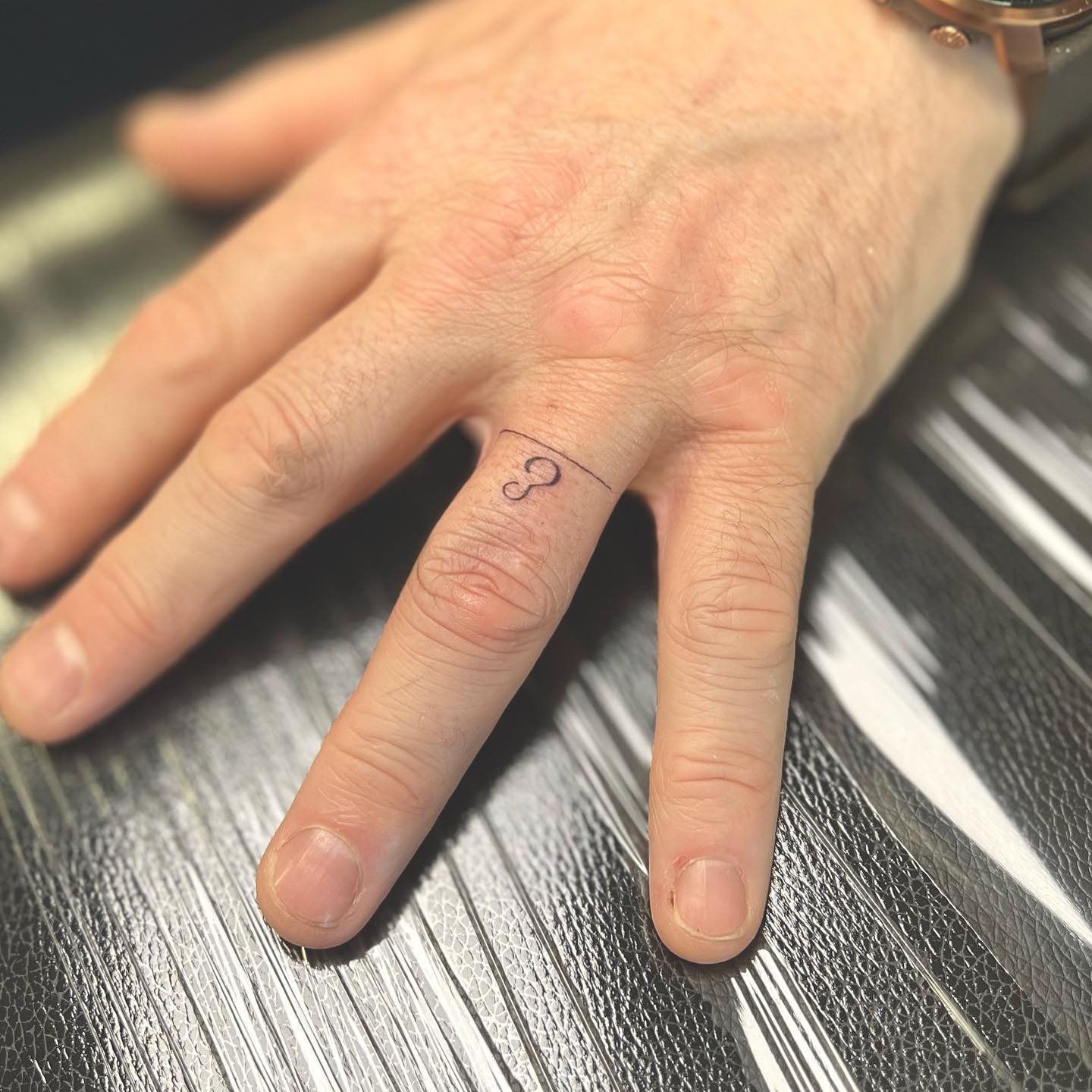 Initial Wedding Band Tattoo