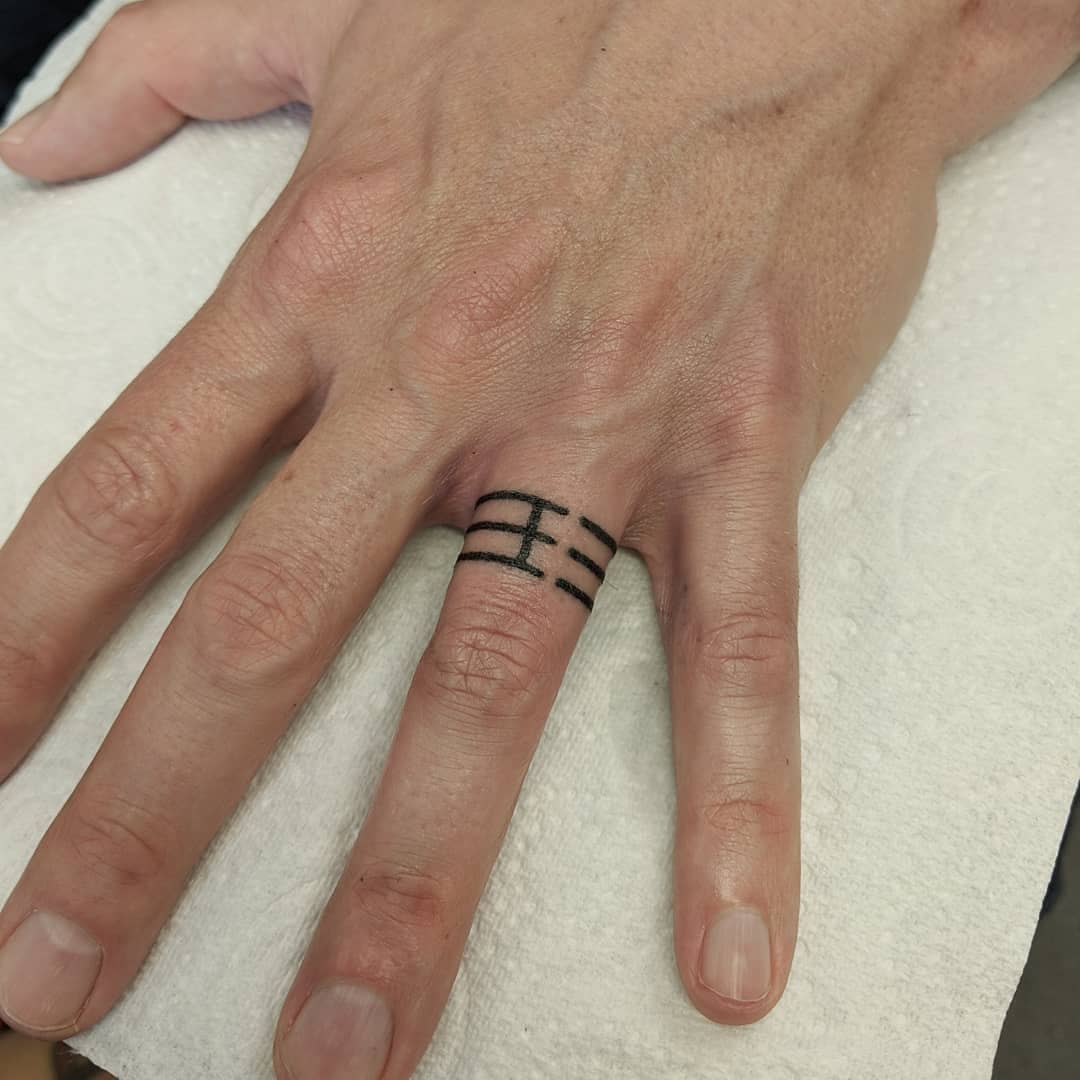 Interlocking Line Wedding Band Tattoo