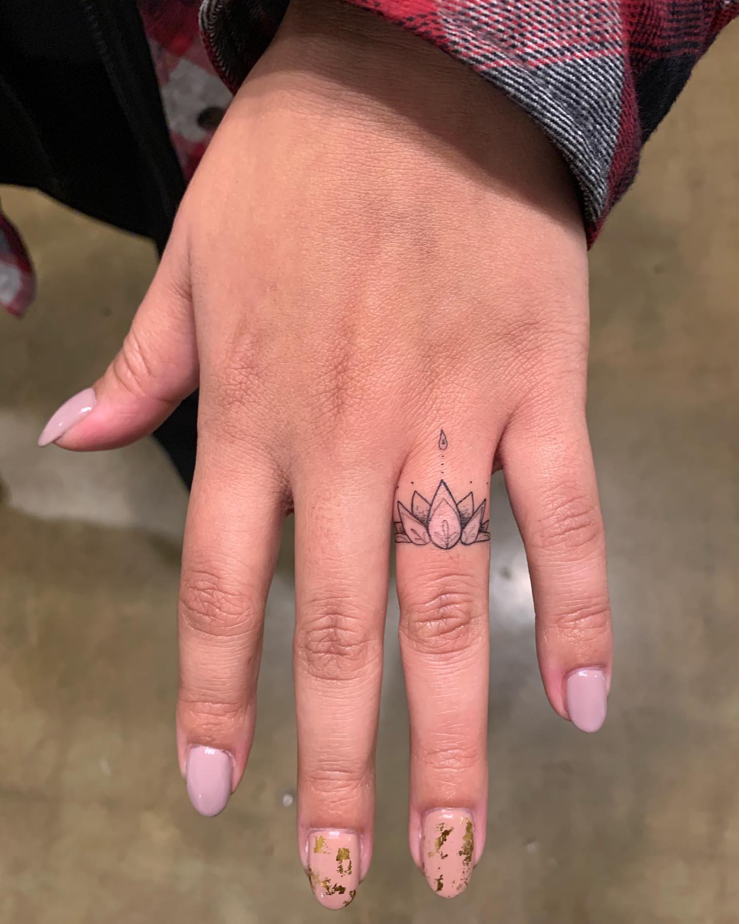 Lotus Flower Wedding Band Tattoo