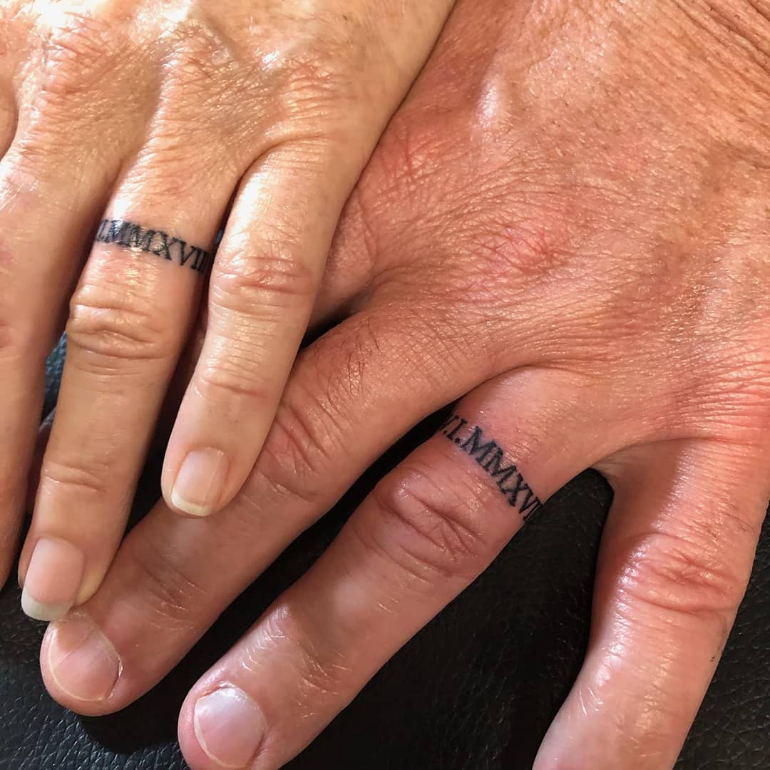 Roman Numeral Date Wedding Band Tattoo