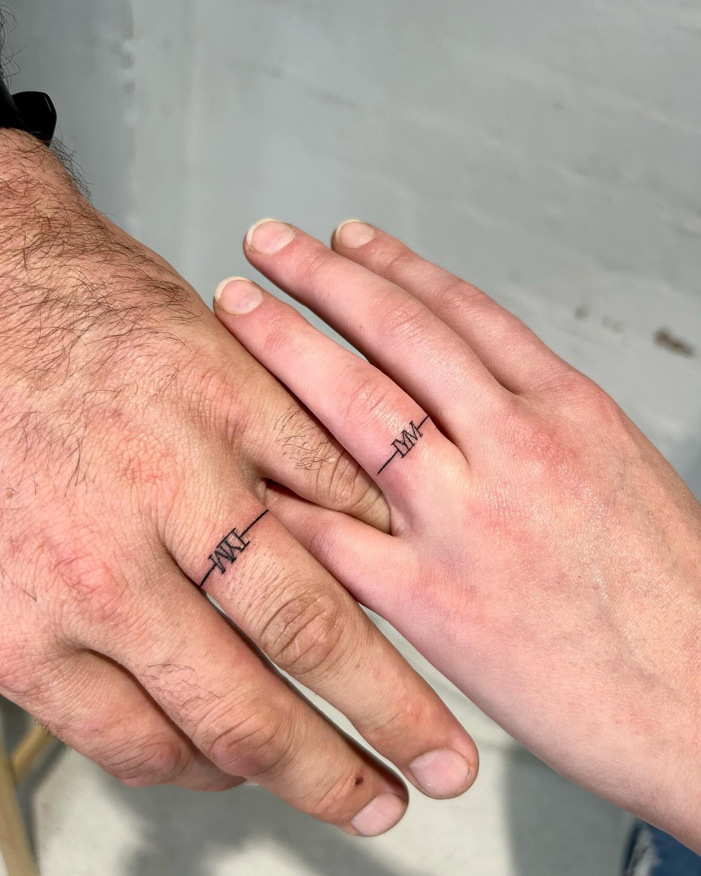Roman Numeral Wedding Band Tattoo