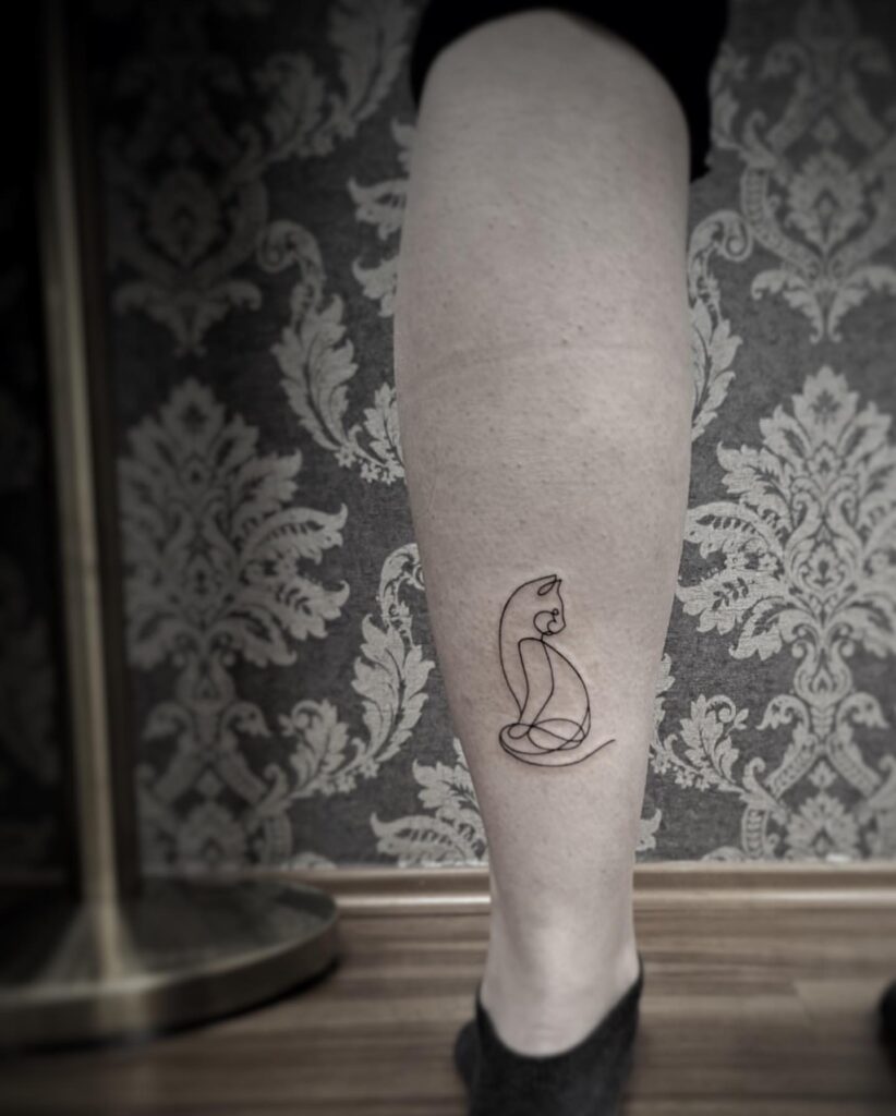 One line cat tattoo