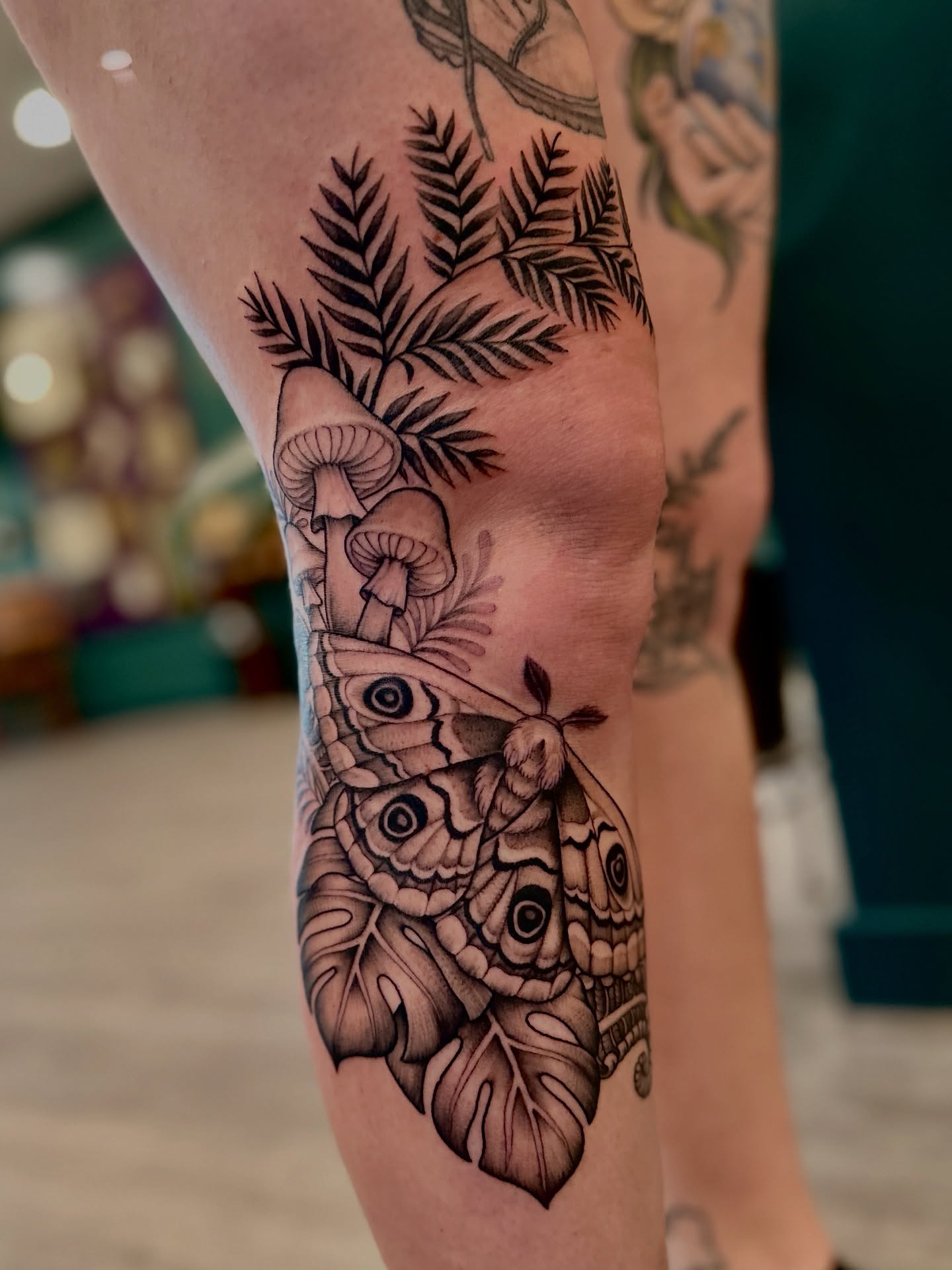 Whimsical Nature-Inspired Knee Tattoo nature tattoos for women tattoo