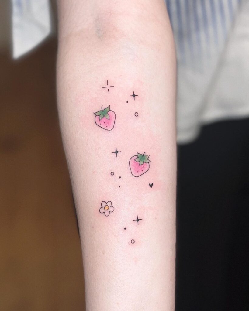Whimsical Strawberry and Flower Tattoo