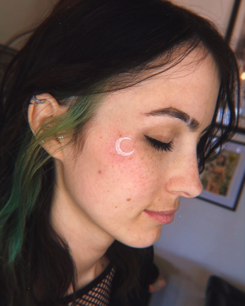 White Ink Crescent Moon Face Tattoo moon tattoos tattoo