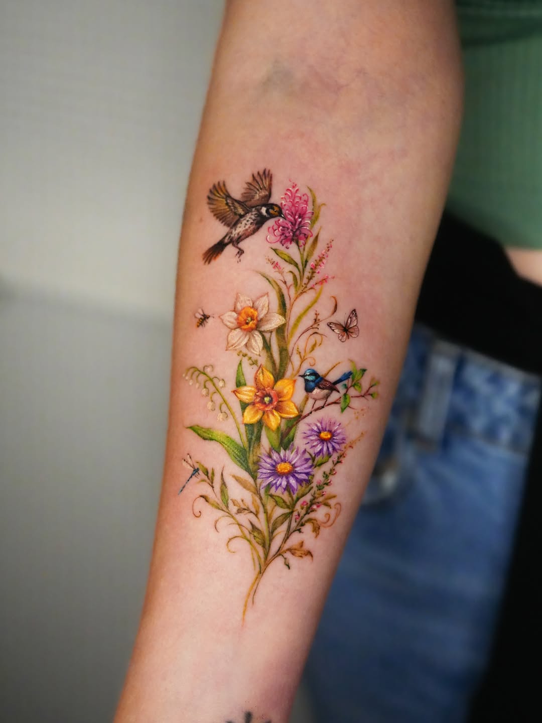 Wildflower Bouquet and Songbirds Tattoo bird tattoos ideas for women tattoo