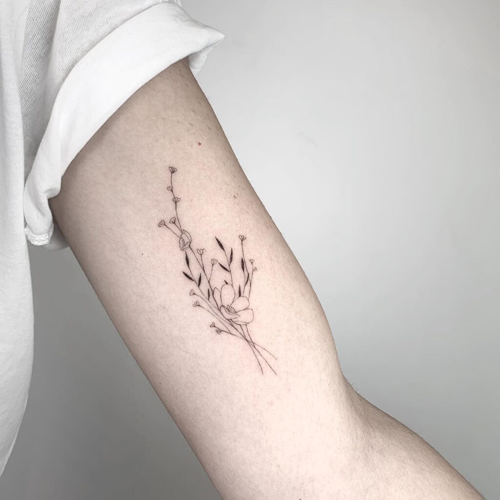 Minimalist Floral Wrist Tattoo minimal tiny flower tattoo ideas tattoo