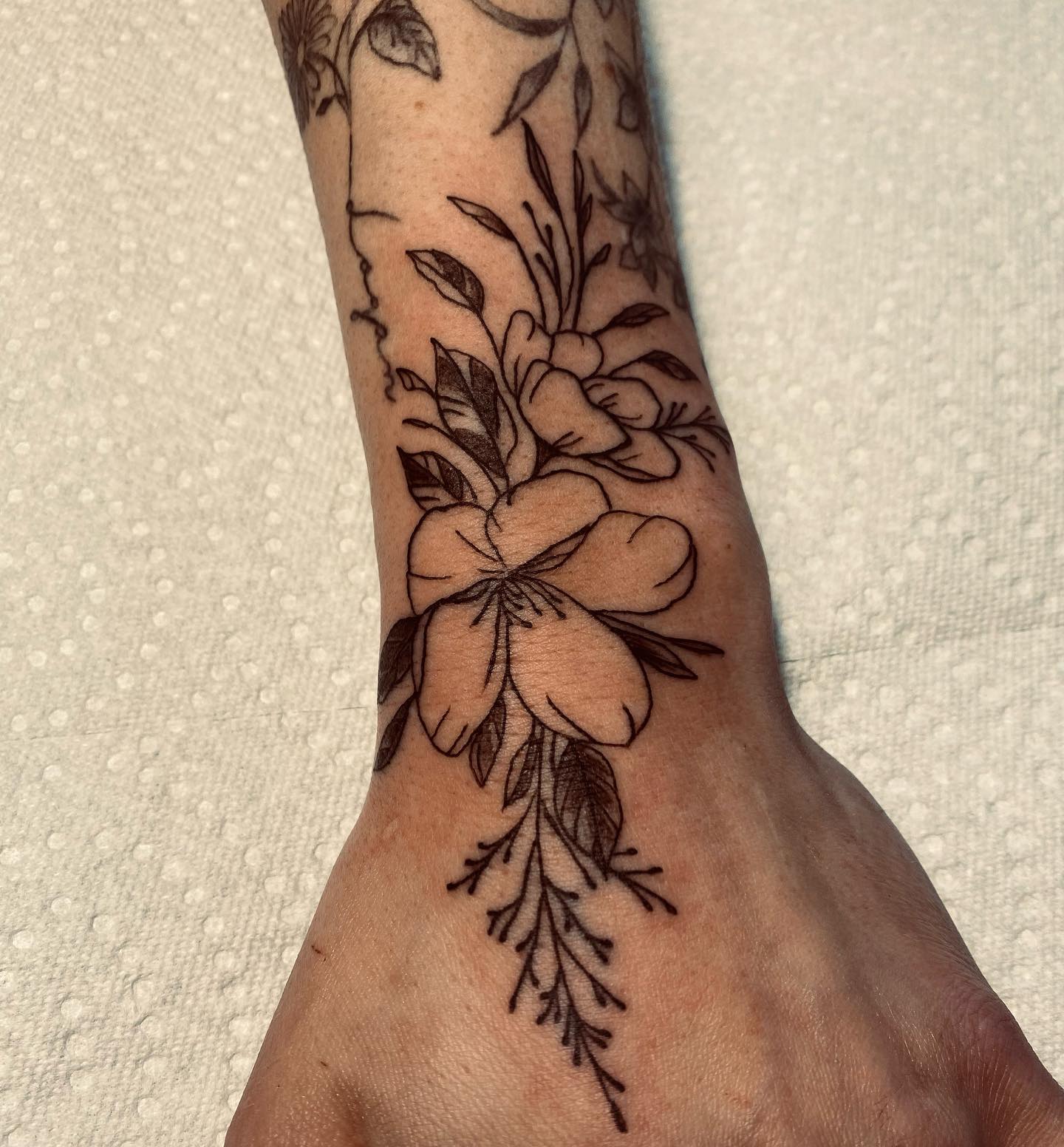 Wildflower Bouquet Wrist Tattoo