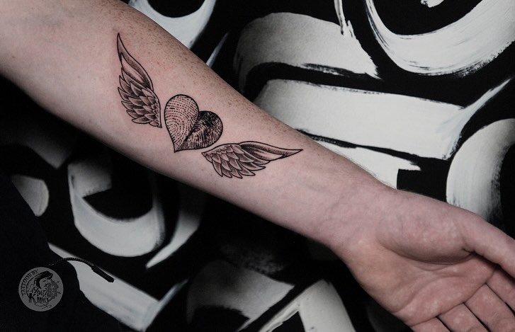 Winged Heart with Fingerprint Tattoo angel wings tattoo ideas tattoo