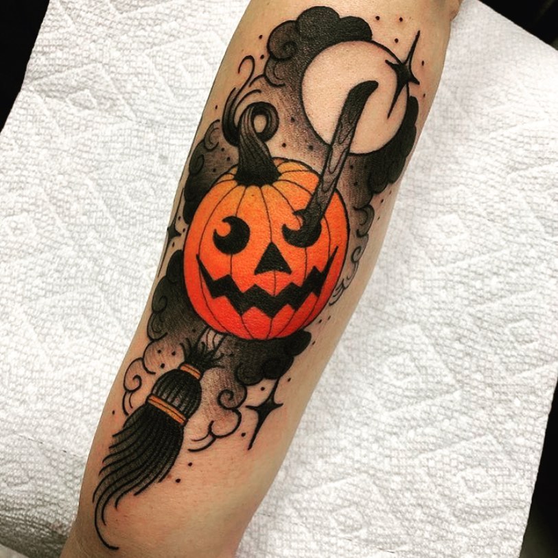 Fierce Jack O’ Lantern Neck Tattoo with Web Accents jack o lantern tattoo ideas tattoo