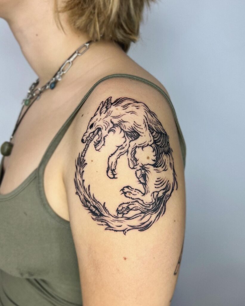Ouroboros Labyrinth And Earth Tattoo On Forearm