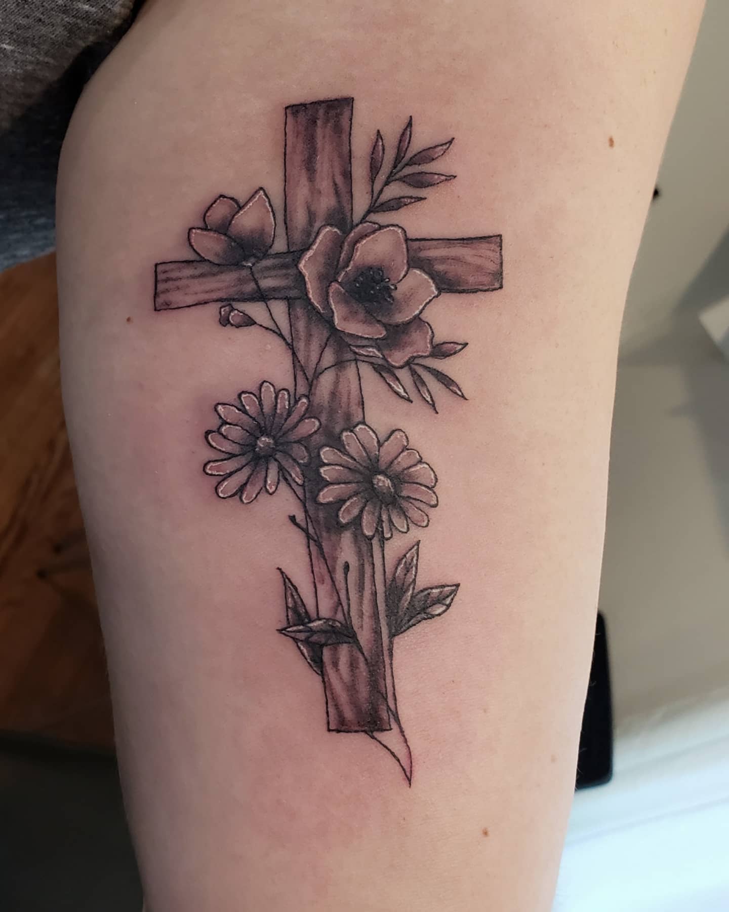 Wooden Cross With Wildflowers Tattoo cross tattoos ideas for women tattoo