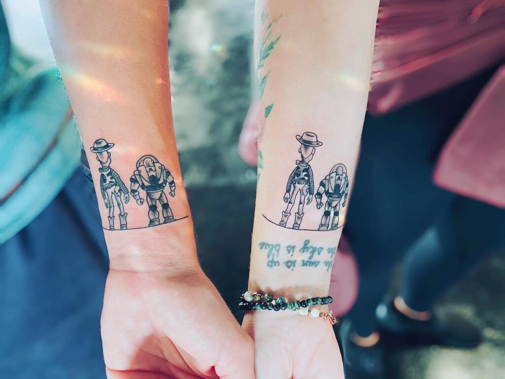 Woody and Buzz Friendship Sibling Tattoo brother sister tattoos tattoo