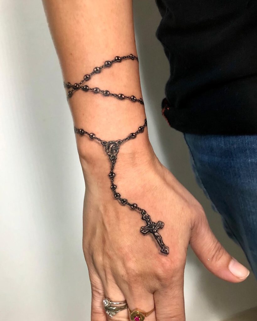 Tiny Finger Rosary Ring Tattoo