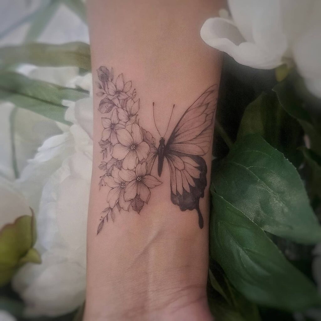 Wrist Bloom and Butterfly Tattoo half butterfly half flower tattoos tattoo
