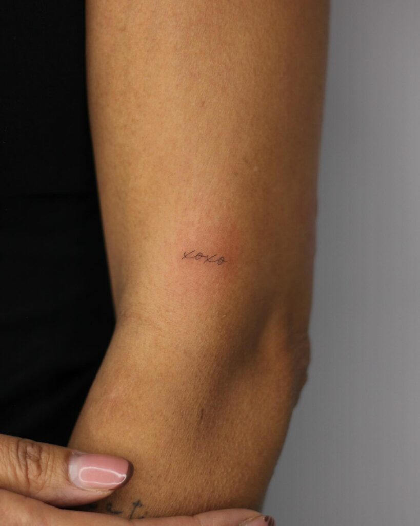 XOXO Arm Tattoo