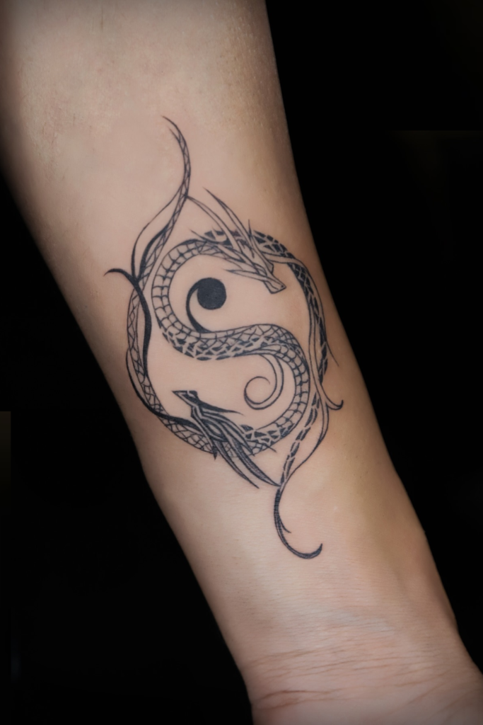 Yin-Yang Dragon Tattoo meaningful tattoos to check out tattoo