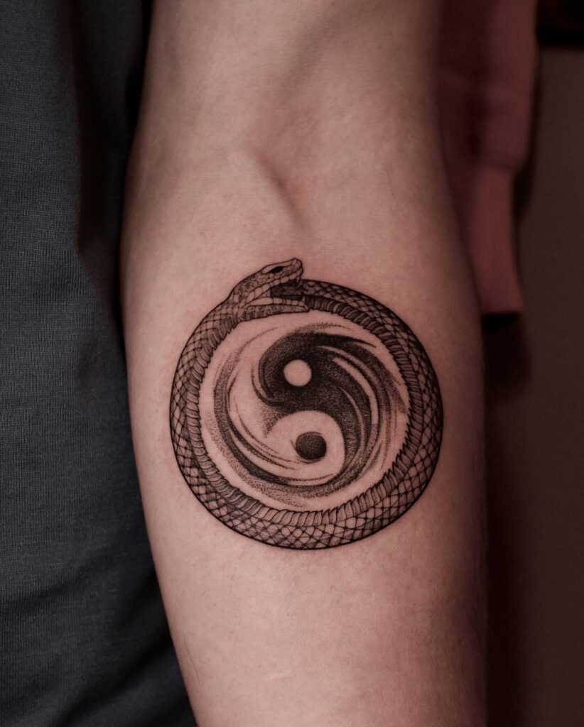 Bold Blackwork Ouroboros Tattoo