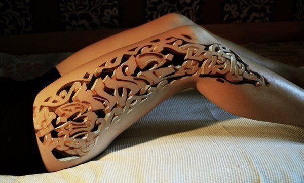3D robotic tattoo on a female’s leg Tattoo on skin