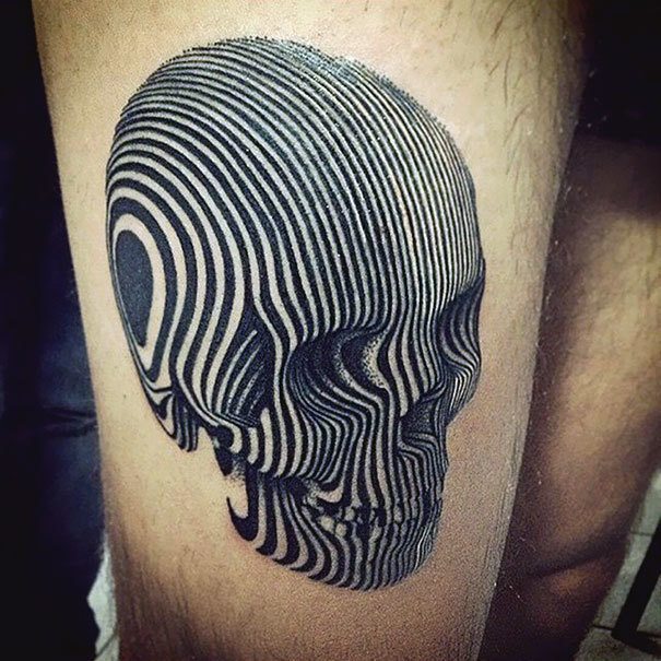 3D skull tattoo on the leg Tattoo on skin