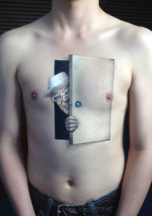 An amazing peeping 3D tattoo on the stomach Tattoo on skin