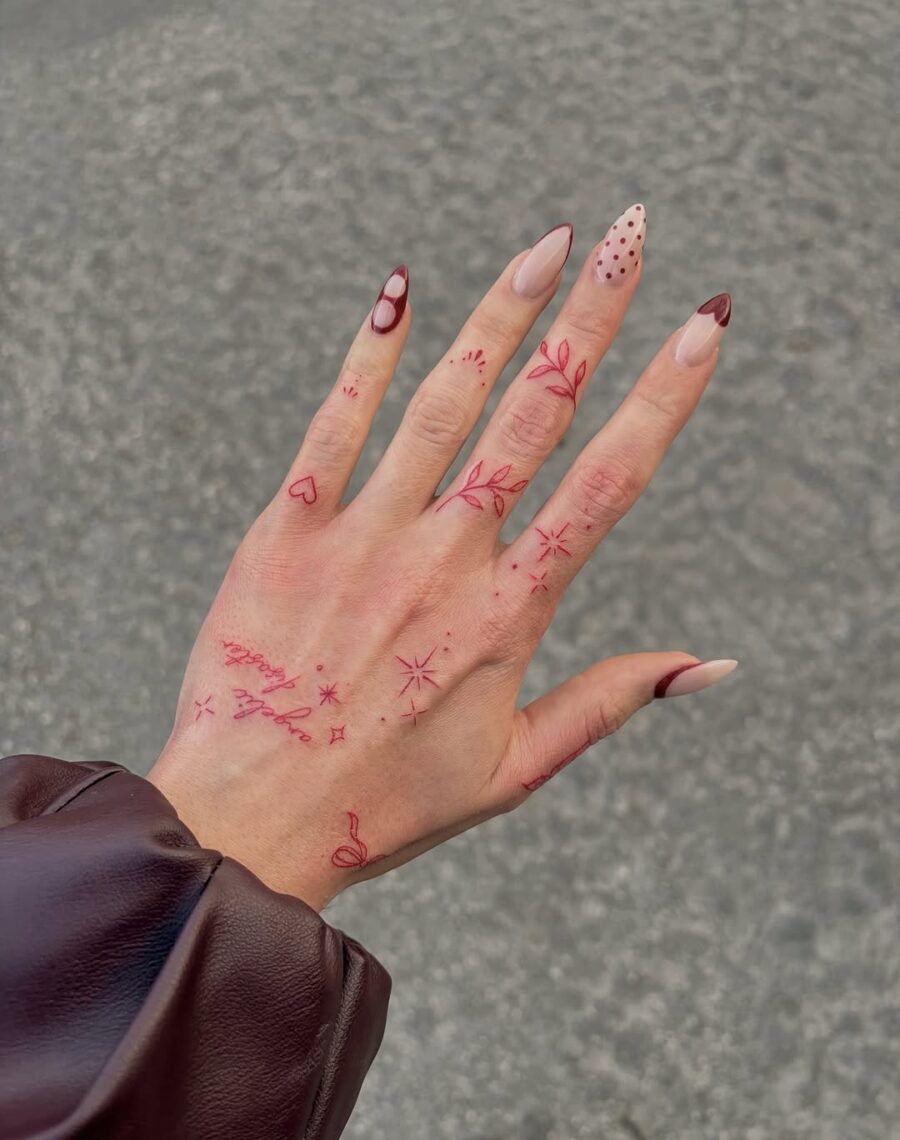 Delicate floral aesthetic on vibrant hand tattoos Tattoo on skin