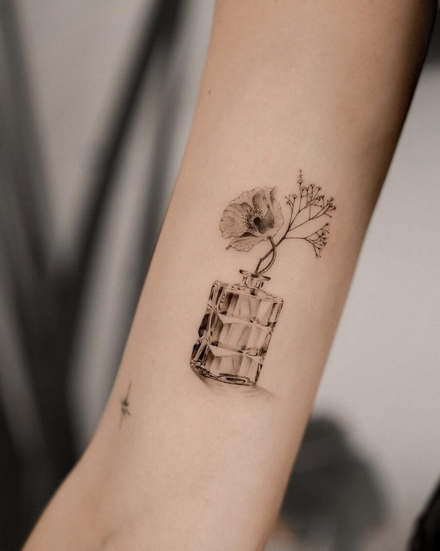 Elegant flower vase tattoo showcasing delicate beauty Tattoo on skin