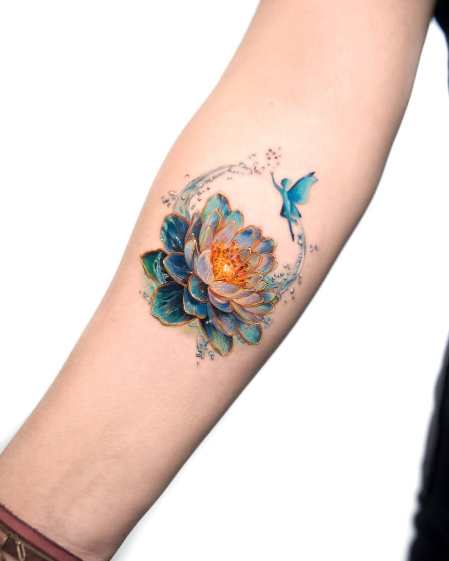 Elegant lotus tattoo filled with vibrant colors Tattoo on skin