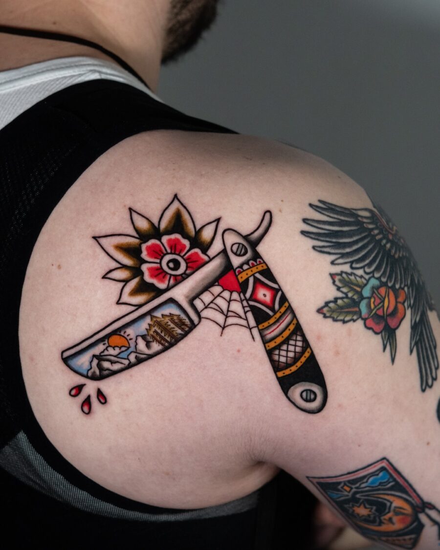 Bold Americana tattoo with razor and flowers Tattoo on skin