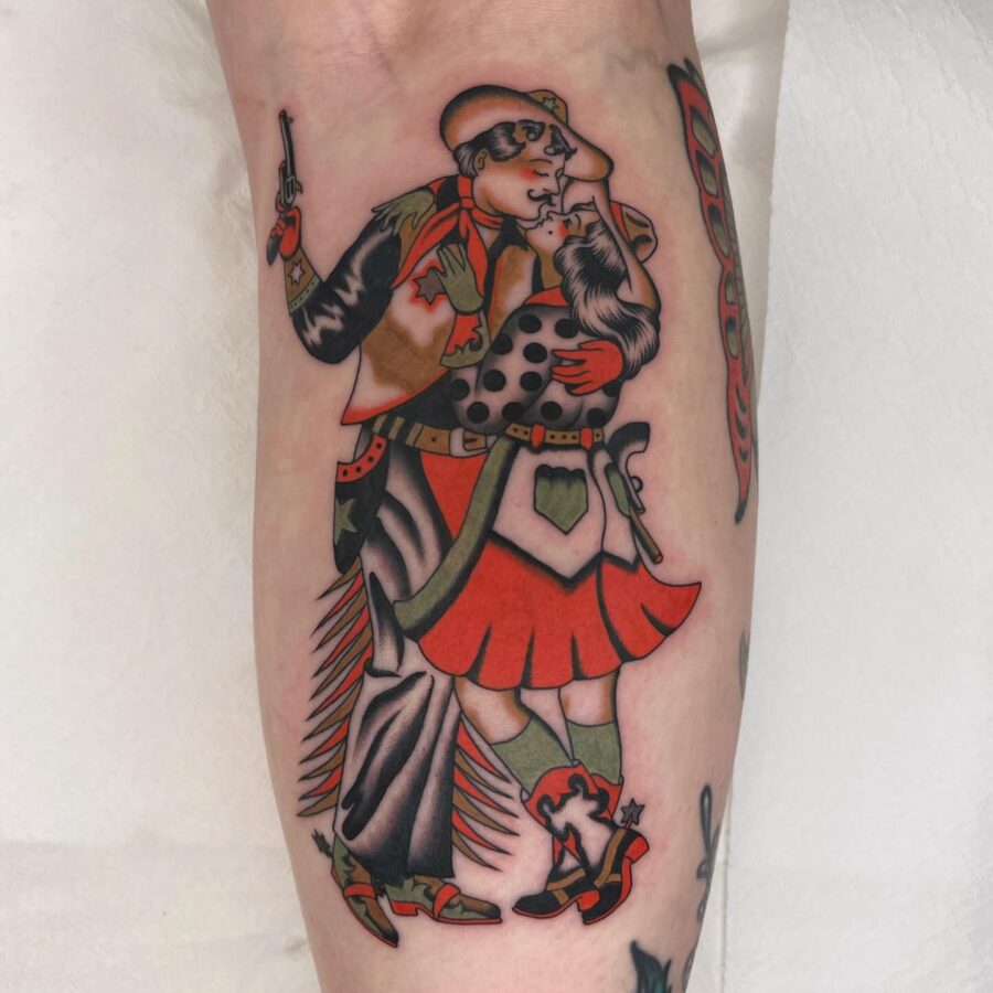 Classic Americana Tattoo of Cowboy and Dancer Tattoo on skin