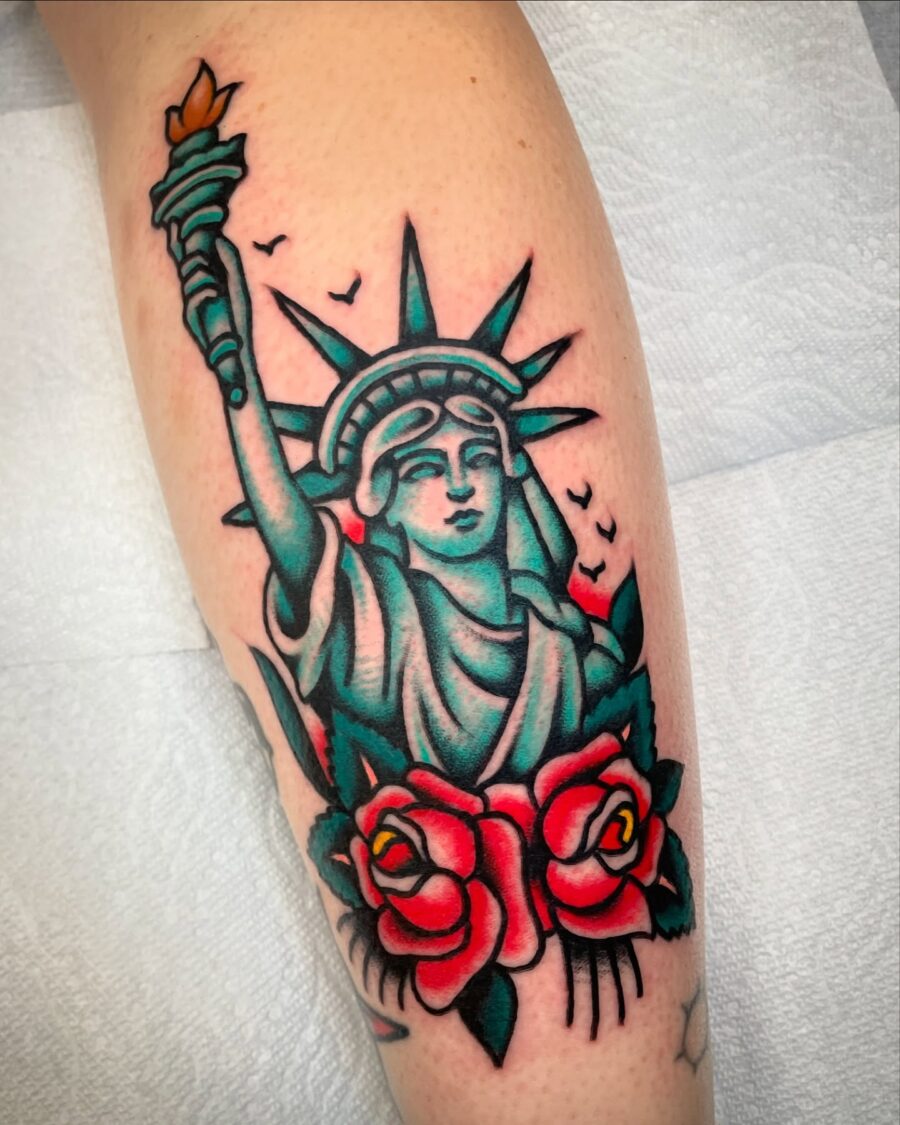 Classic Americana tattoo with Statue of Liberty Tattoo on skin