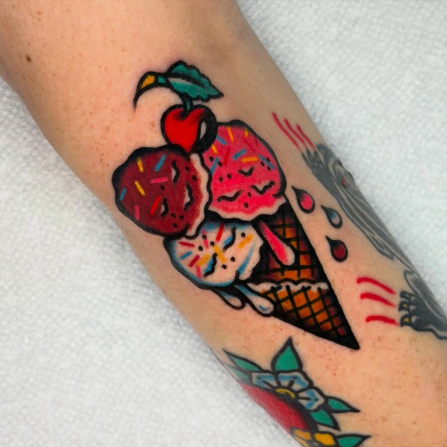 Colorful ice cream tattoo showcasing Americana style Tattoo on skin