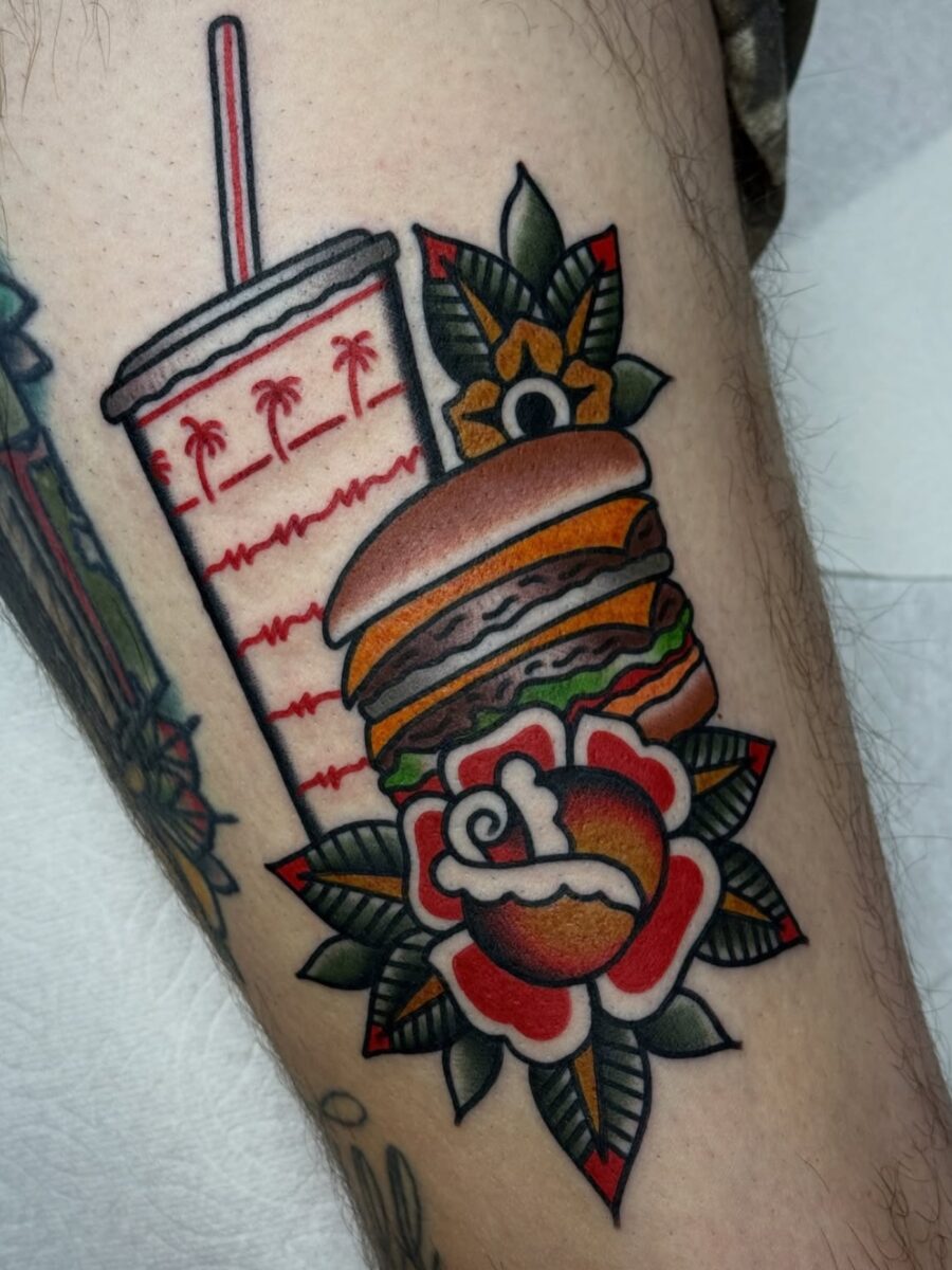 Playful Americana-style burger and drink tattoo Tattoo on skin