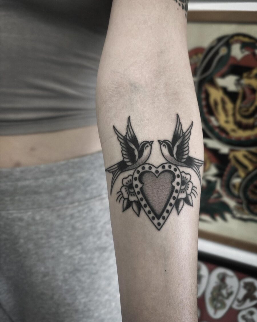 Symbolic Americano tattoo of love and peace Tattoo on skin
