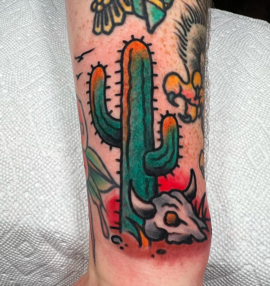 Vibrant Americana cactus and skull tattoo design Tattoo on skin