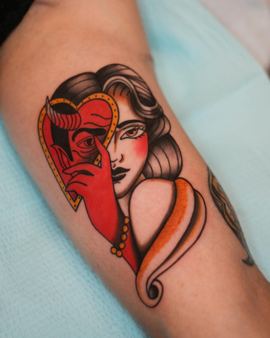 Vibrant Americana Heart Tattoo with Dual Faces Tattoo on skin