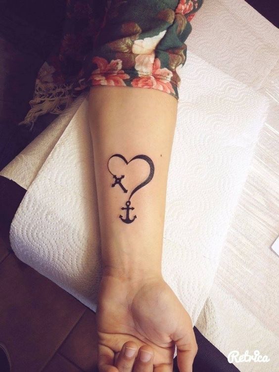 Love Conquers All Forearm Anchor Tattoo Tattoo on skin