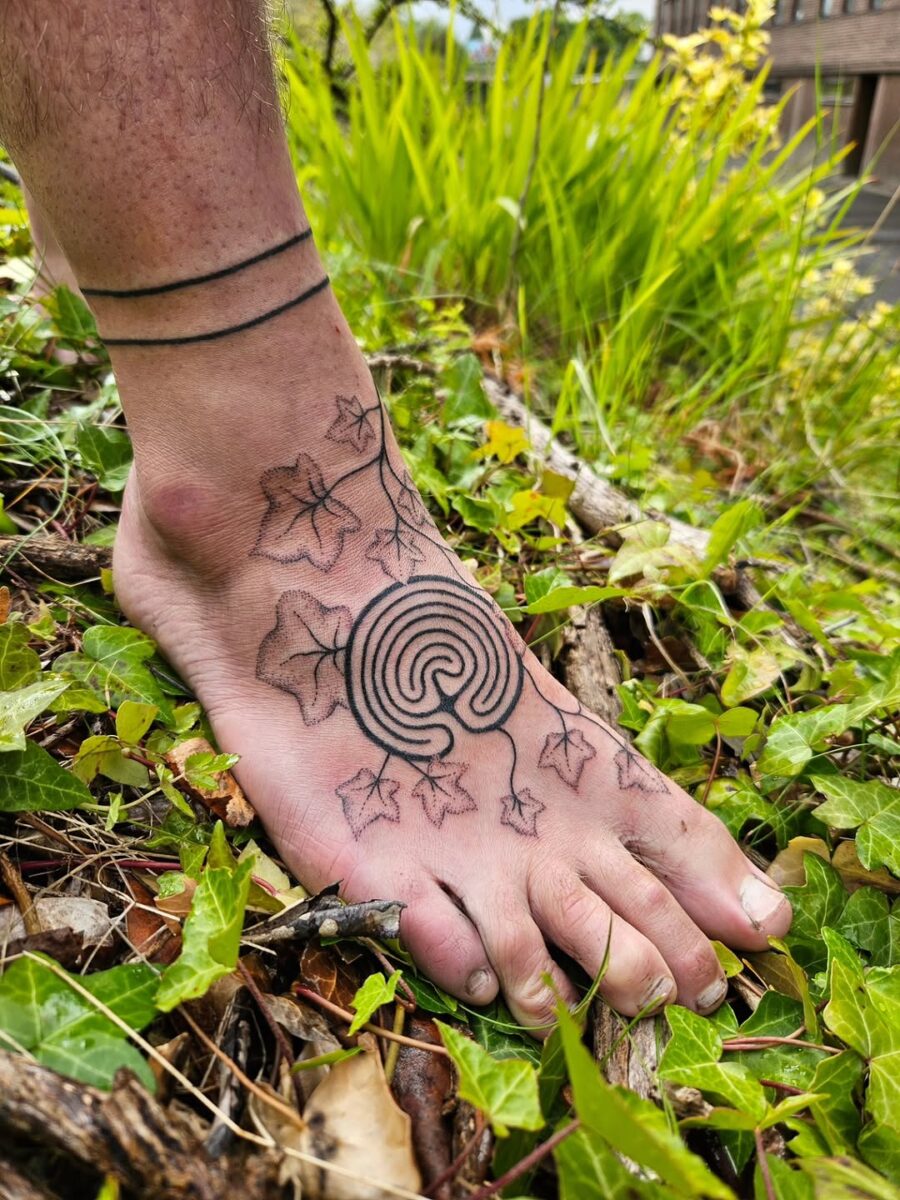 A stunning labyrinth tattoo with ivy vibes Tattoo on skin