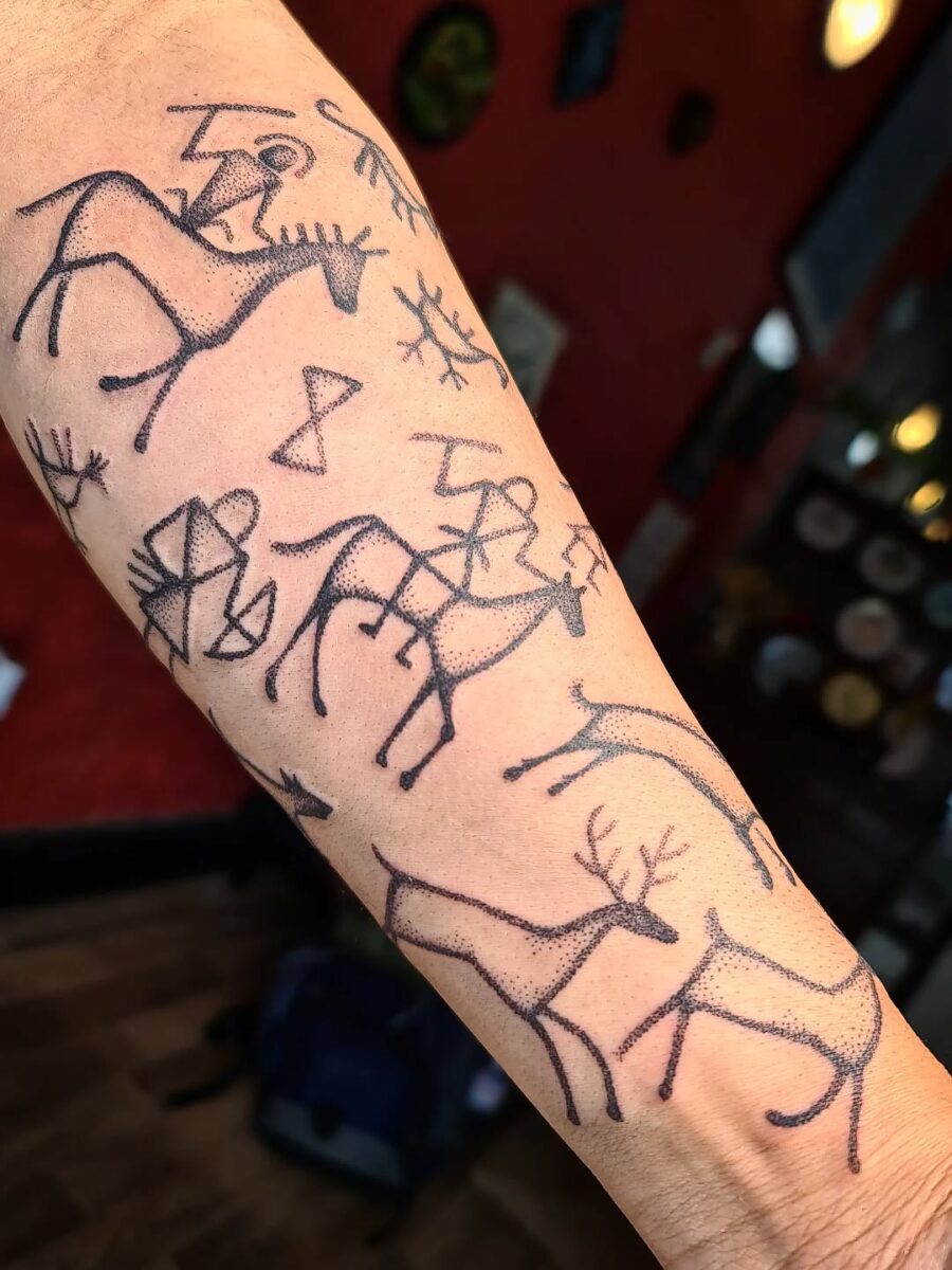 Captivating ancient tribal art tattoo design Tattoo on skin