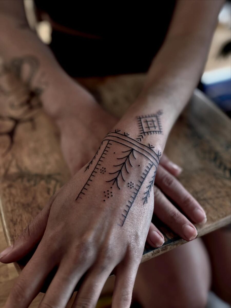 Elegant blend of geometry and nature in tattoos Tattoo on skin