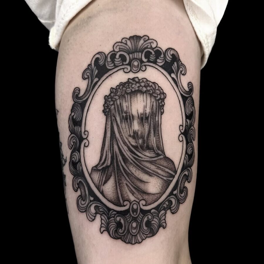 Elegant tattoo reminiscent of classical sculpture influences Tattoo on skin