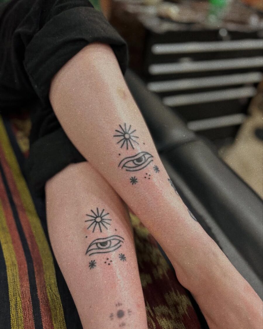 Mystical Eye Tattoos with Radiant Sun Motifs Tattoo on skin